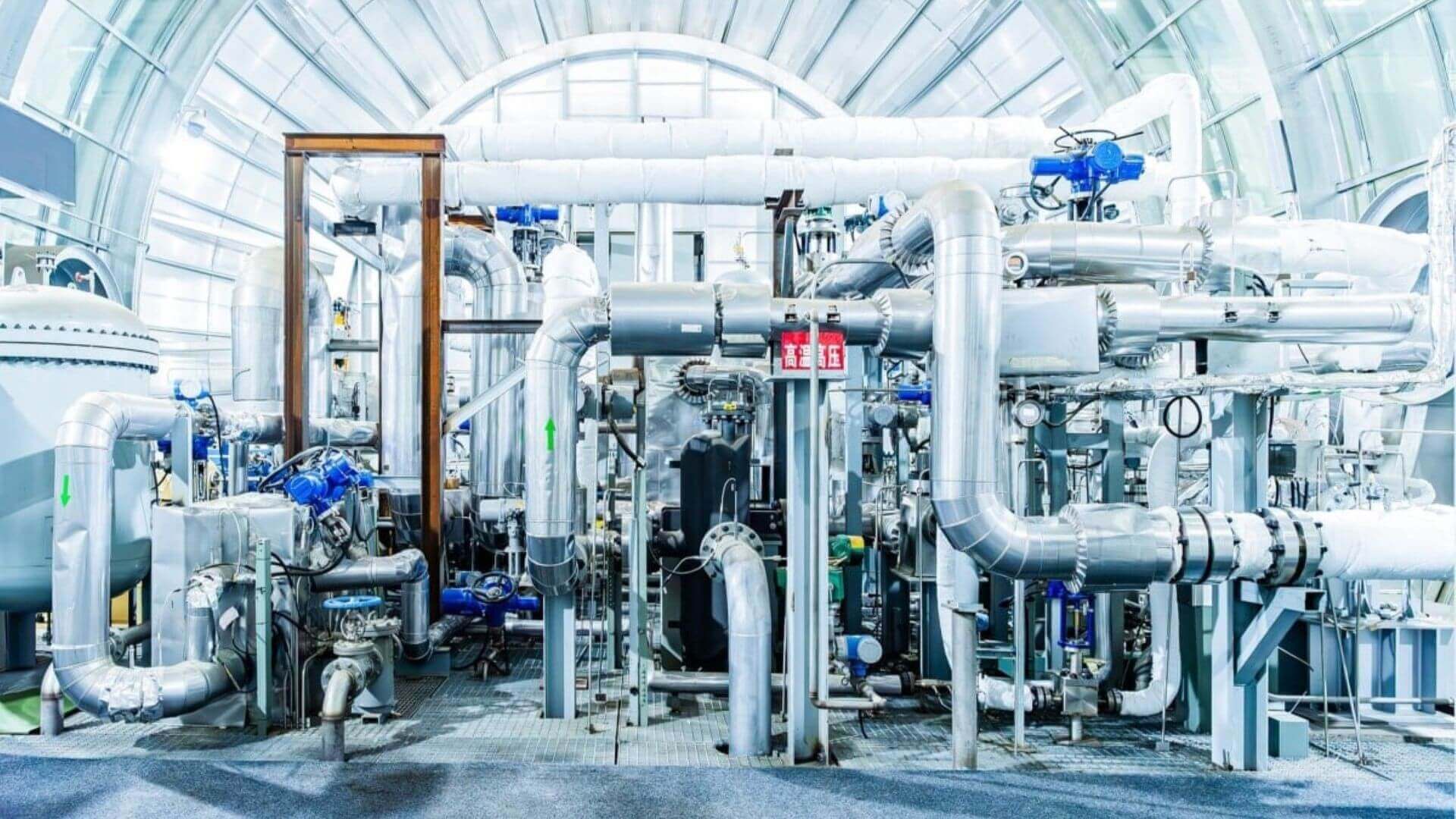 A large industrial machine with many pipes