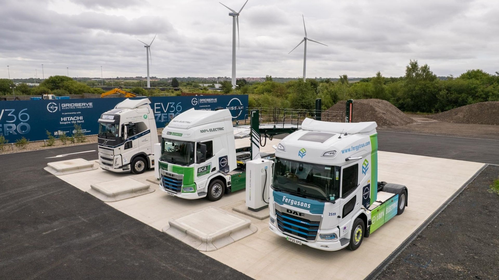 Three HGVs at charging station