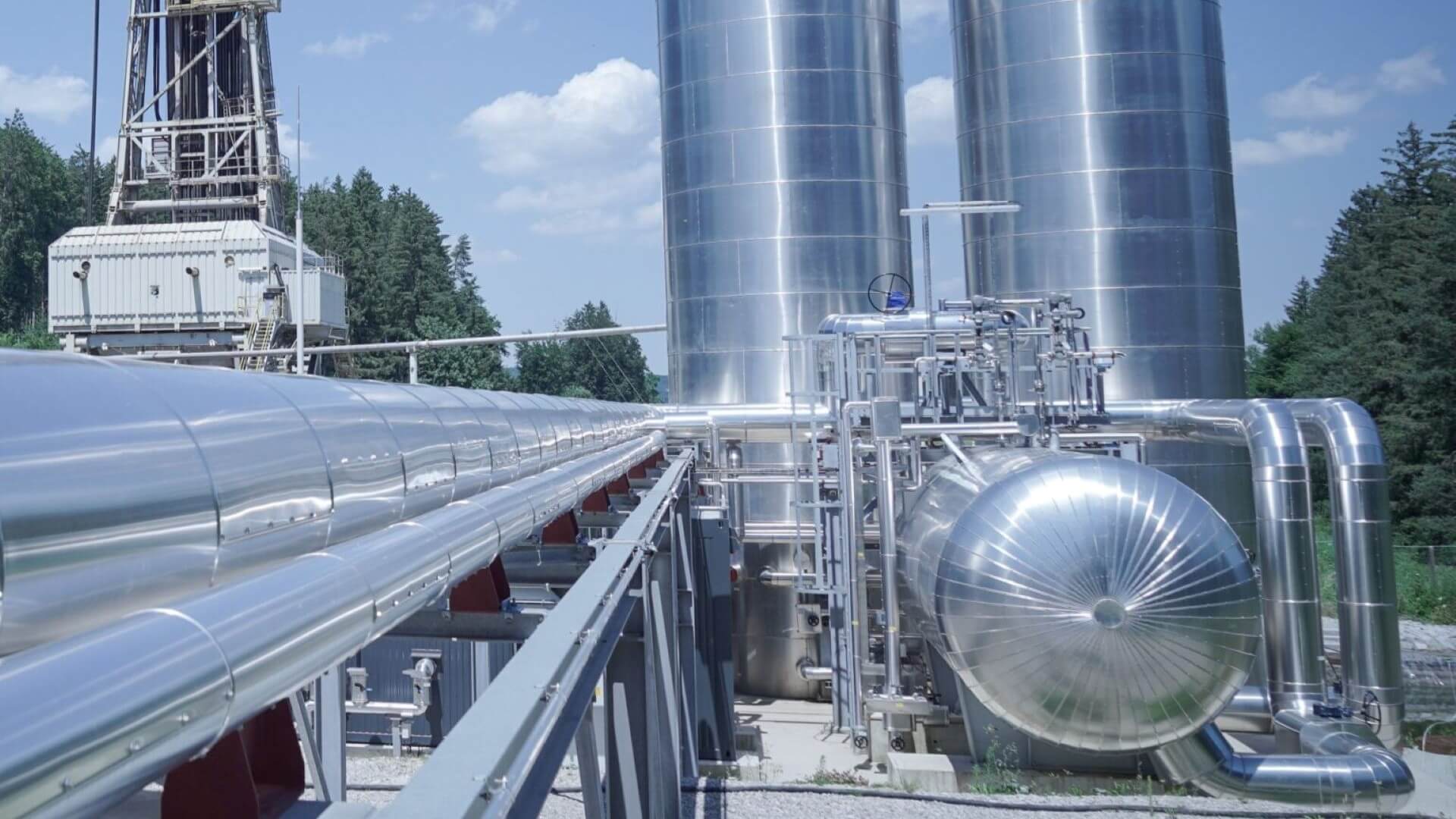 Close up of shiny metal pipework, tubes and cylinders