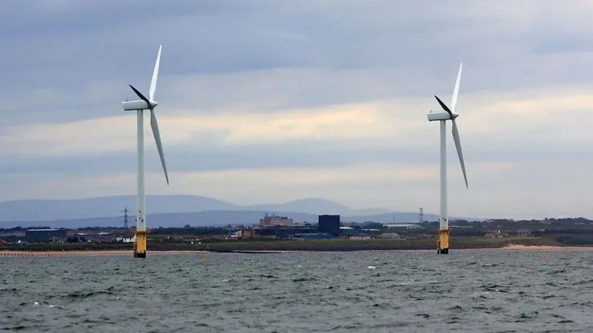 Two wind turbines offshore