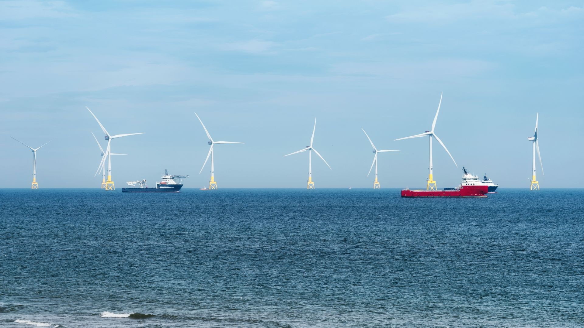 Wind turbines and support vessels offshore