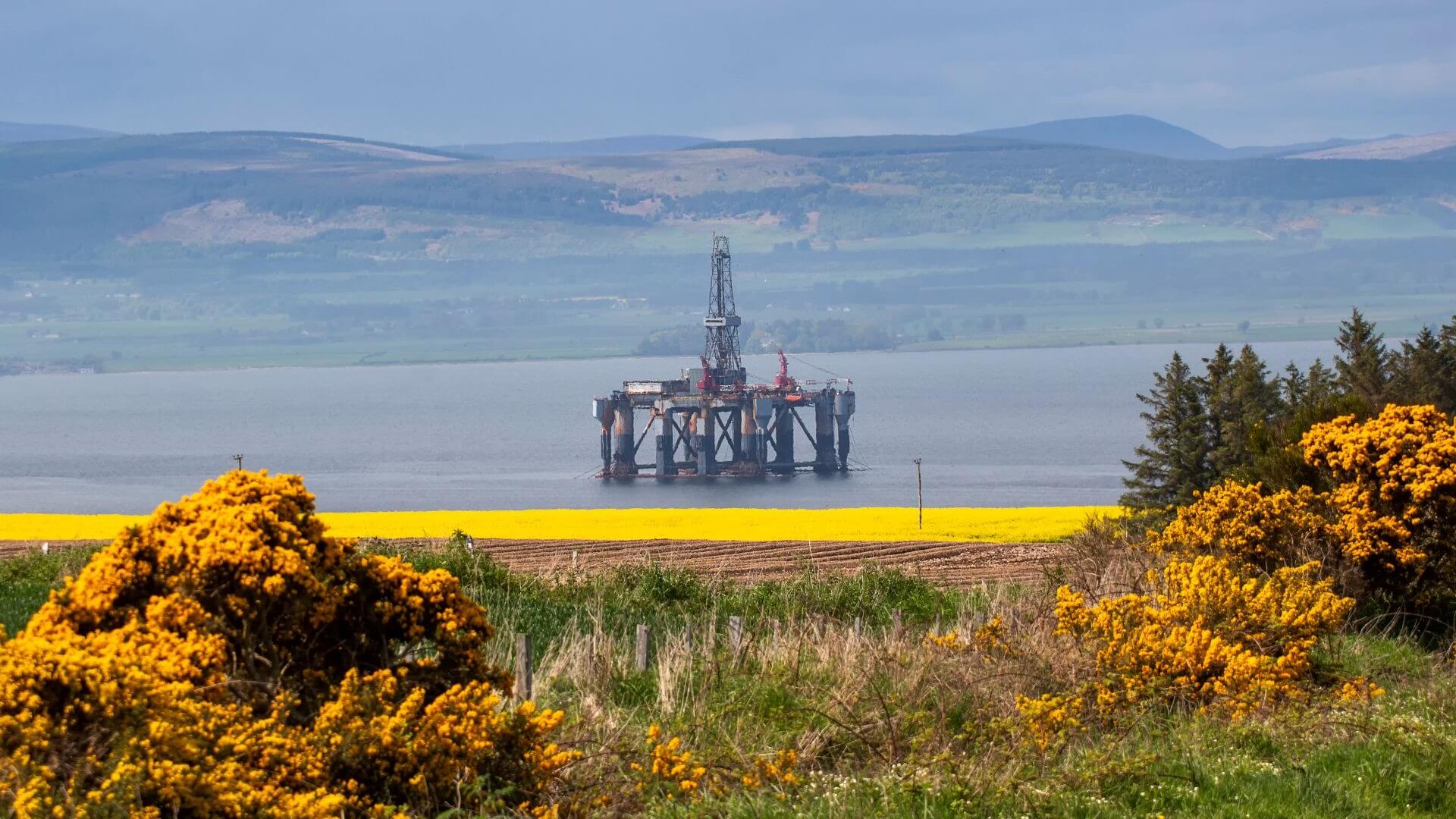 View from onshore of a drilling rig just off the coast
