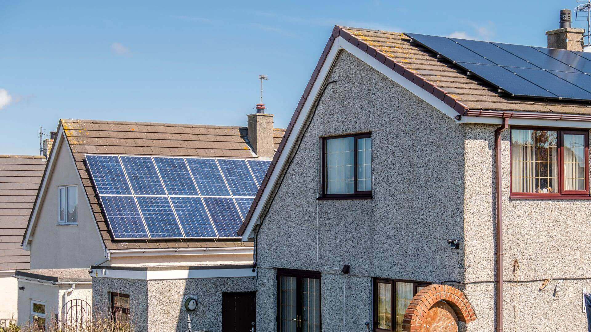 Solar panels on roofs in residential area