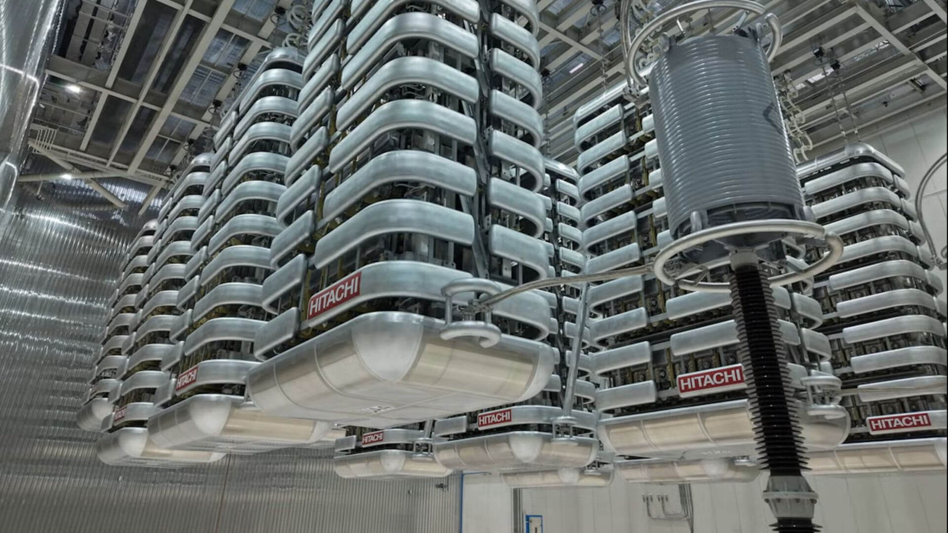 Close up of three large valves in large hall, showing the valves segmented structure
