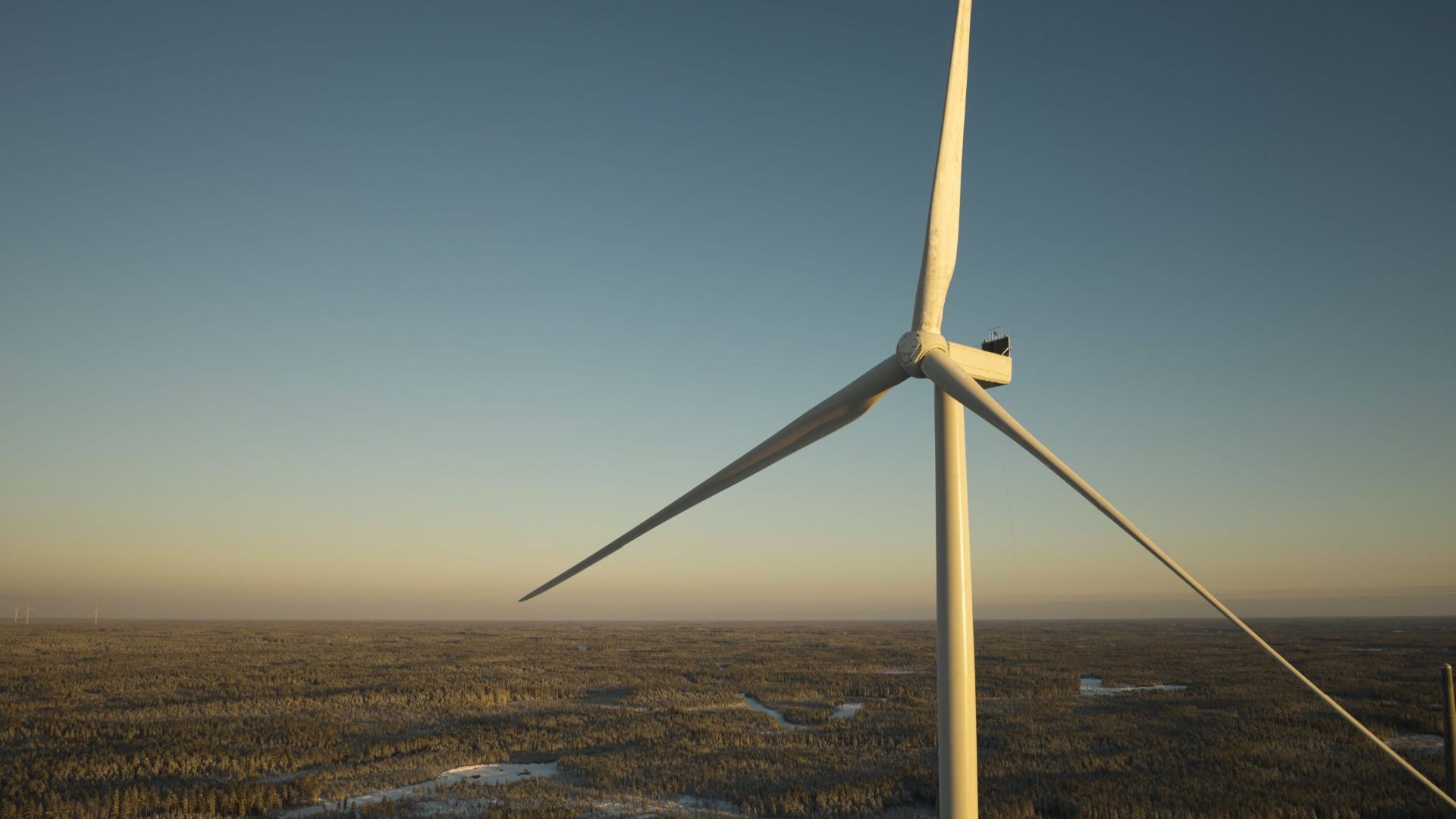 Close up of three blades on an onshore wind turbine