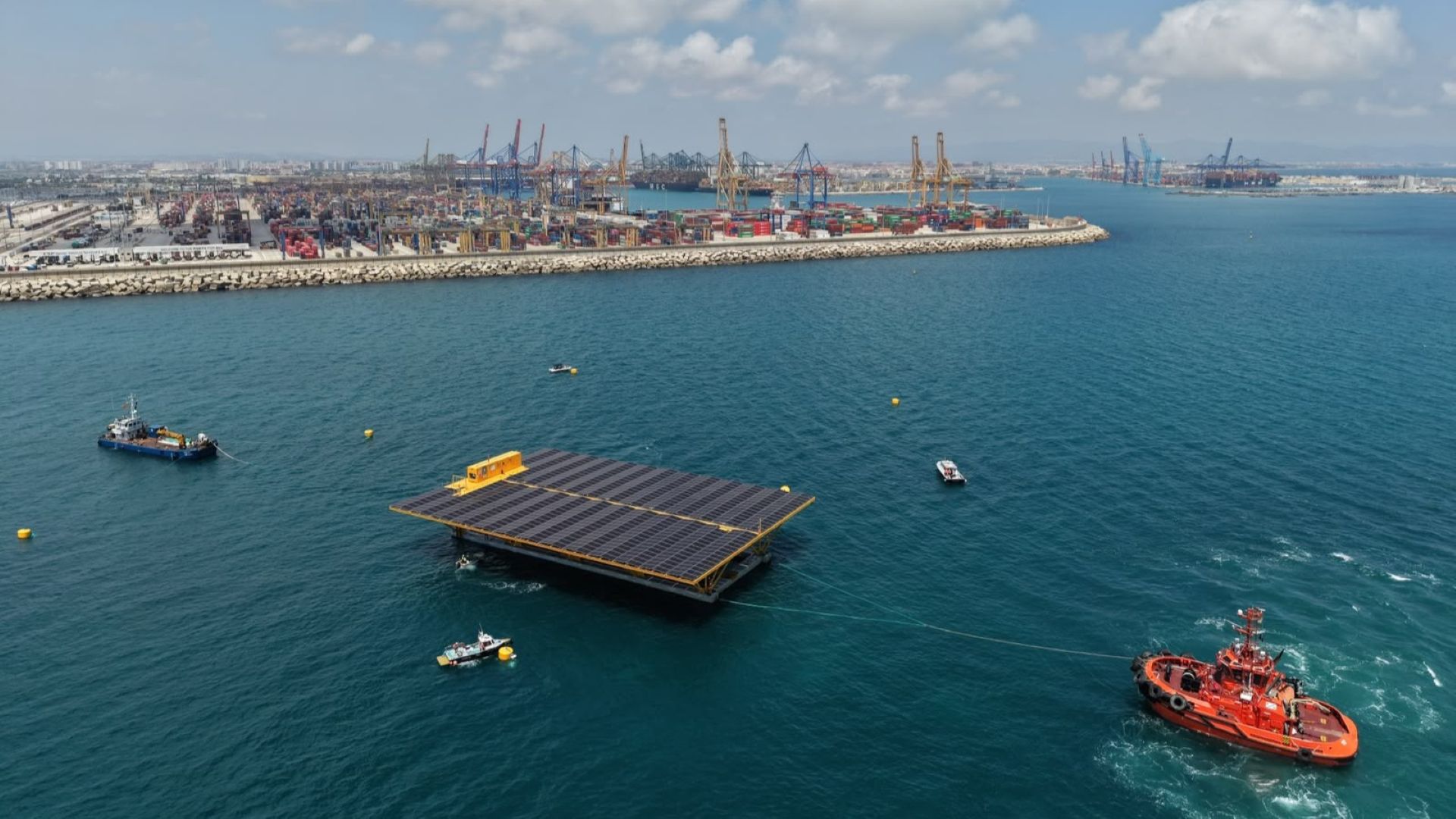 Aerial view of platform being towed to port
