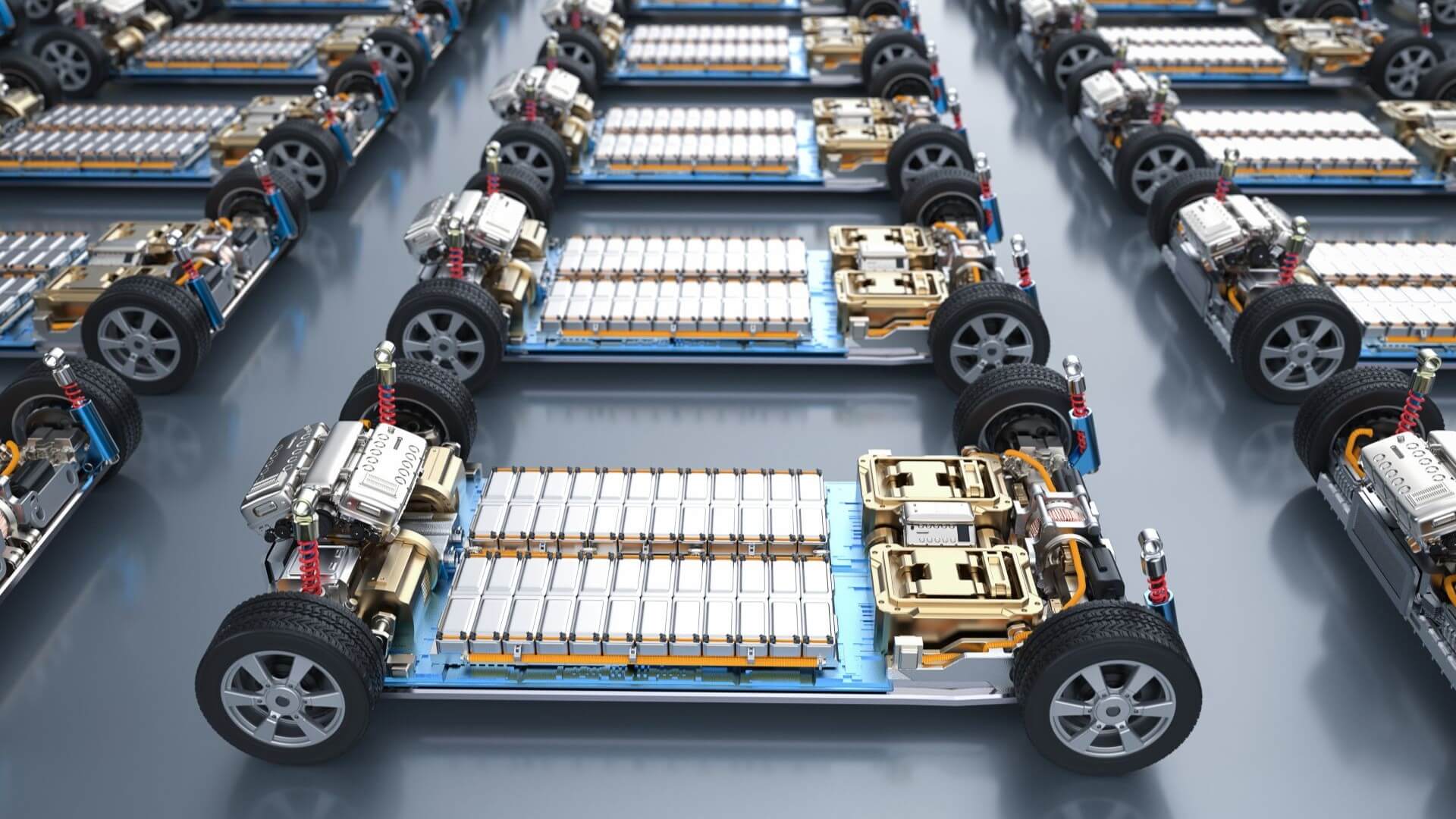 Rows of electric vehicles under manufacture