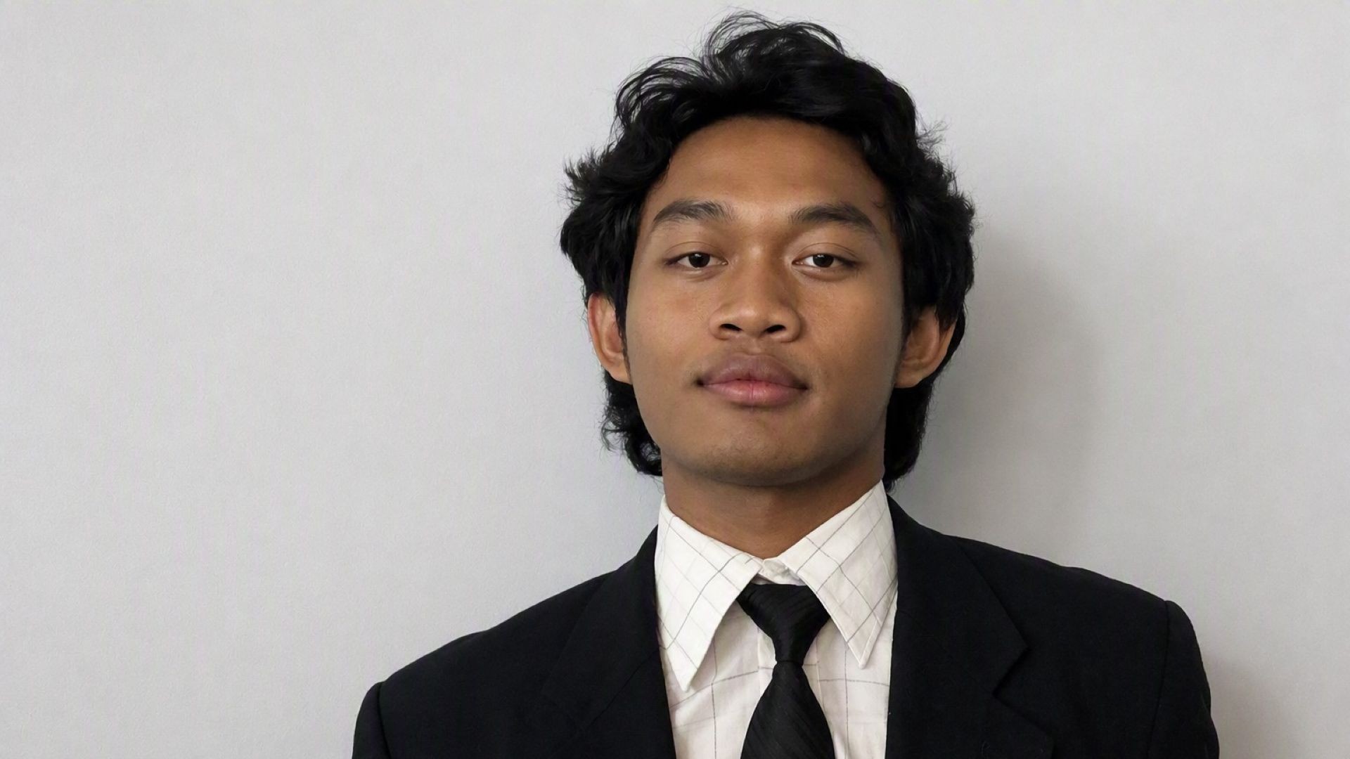 Head and shoulders photo of Alif Zharfan M Zamri