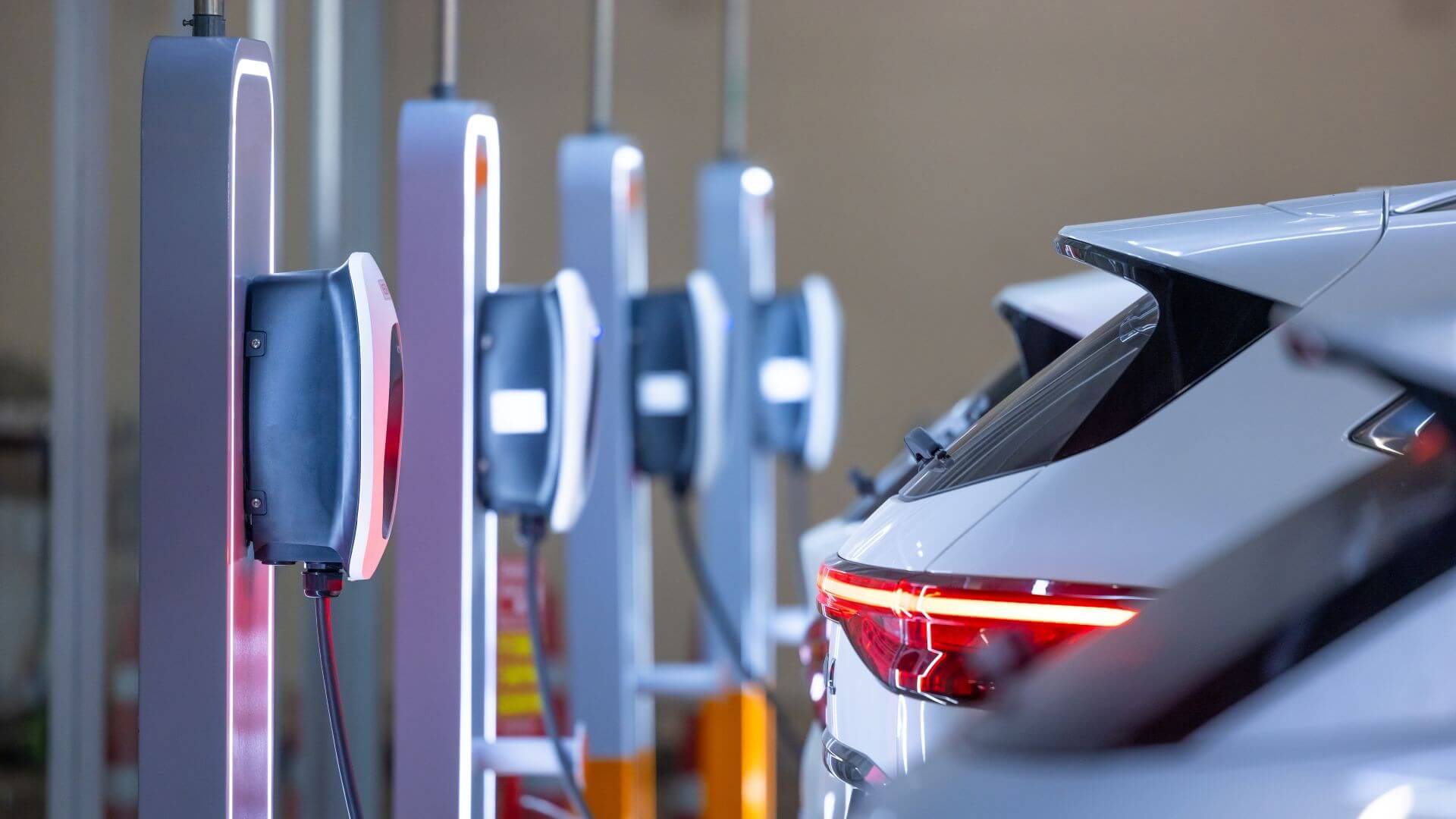 Row of electric vehicles charging