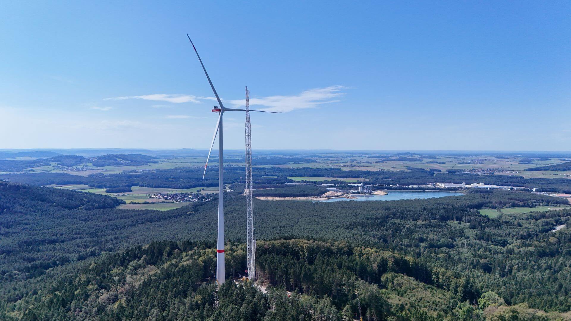 Tall wind turbine and surrounding countryside